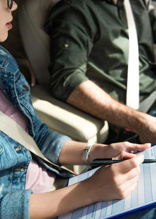 student-and-teacher-in-car-at-dri-FUHBPMU